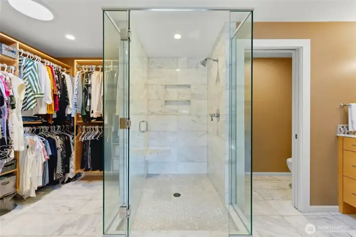 Primary bedroom attached walk-in closet and 3/4 bathroom