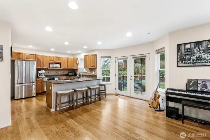 Classy kitchen with granite countertops and high end stainless steel appliances, notice the built in vertical plate holders
