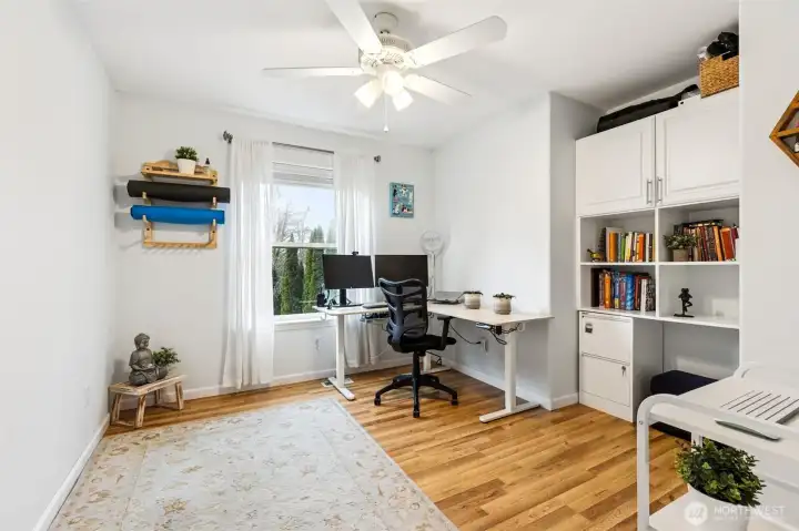 Upstairs bedroom with built-in desk unit, great space for an office or guest room