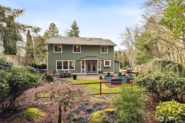 Amazing backyard space, private setting, Dual fencing thoughtfully defines the lawn while preserving the beauty of the landscaped surroundings