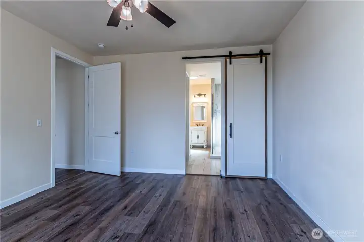 primary bedroom looking into bathroom