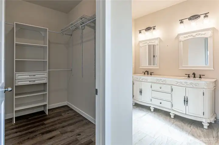primary walk-in closet & primary bathroom