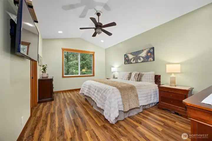 Primary bedroom is tranquil and roomy.