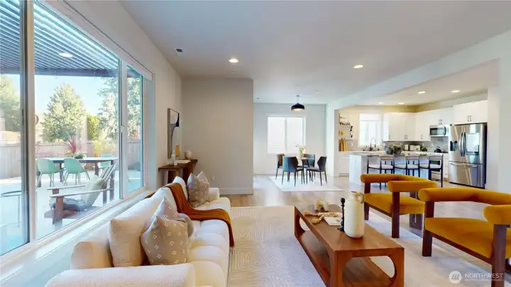 Great Room with kitchen open to living and dining spaces.