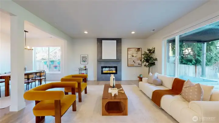 Formal living room flanked by formal dining area.