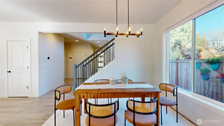 Great room - Formal dining space across from kitchen.  The door on the left is the pantry.