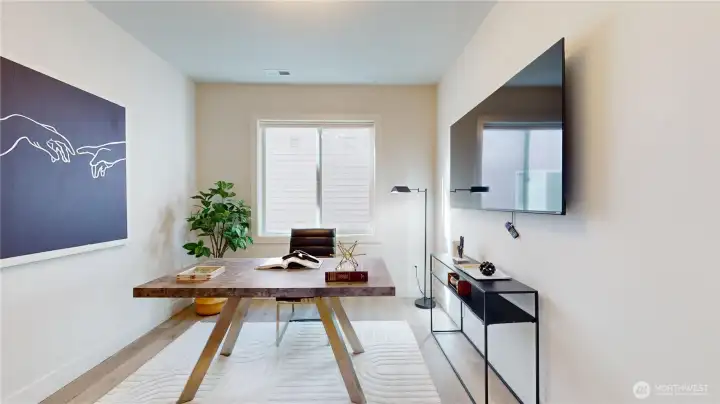 Double doors open into first floor bedroom across the hall from a 3/4 bath makes a comfortable guest room or private office.