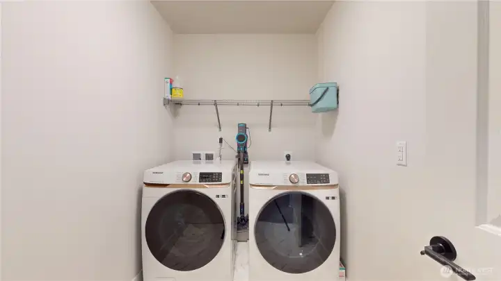 Upstairs - Dedicated laundry.  Premium Samsung washer/dryer included in sale.