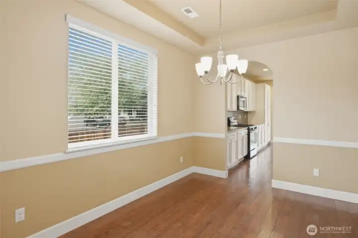 Dining room leading into kitchen Dining room leading into kitchen