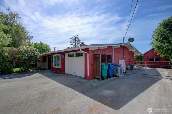The home has a one car garage but plenty of off street parking as well as RV parking. The shop is in the back yard behind the fence.