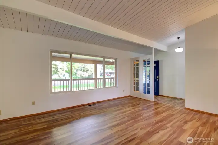 Entryway with vaulted ceilings.