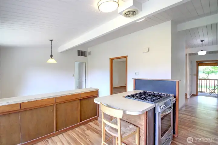 A view from the kitchen to the front door.