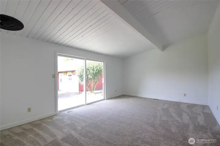 On the opposite side of the house is a large finished room. A second living room or separate living space.