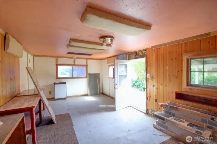 The inside of the shop is quite ample.  It was previously used as a band practice area.