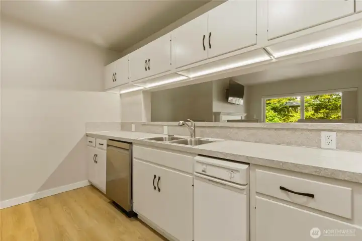 Pass through with new surfaces and under cabinet lighting. Pass through with new surfaces and under cabinet lighting.