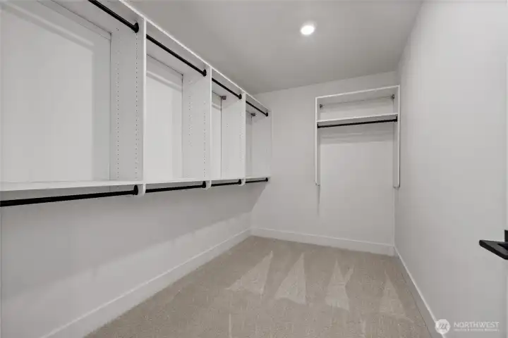 massive walk in closet with built ins