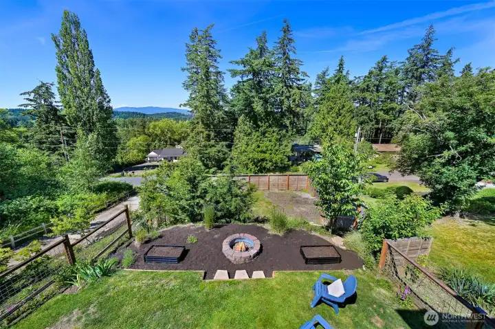 View from the deck, looking west towards the islands and to the fully-fenced back yard. Imagine the sunsets!