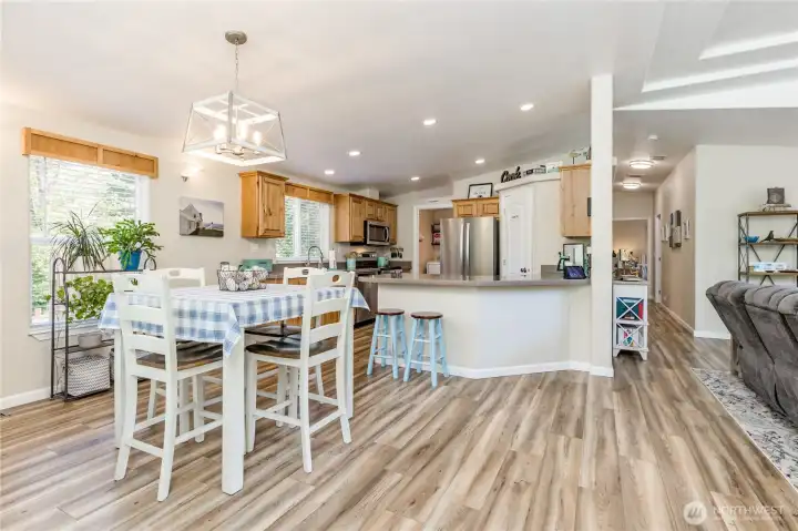Waterproof laminate flooring runs through the entire home for easy cleanup. Waterproof laminate flooring runs through the entire home for easy cleanup.