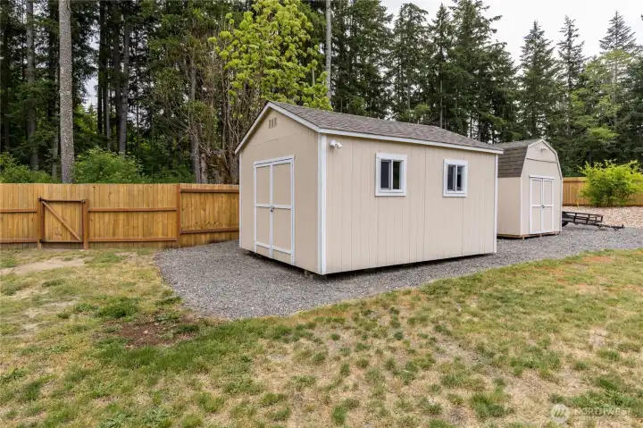 Bring your hobbies to life! Two detached outbuildings provide incredible space for dedicated workshops, a studio, or extra storage. Bring your hobbies to life! Two detached outbuildings provide incredible space for dedicated workshops, a studio, or extra storage.