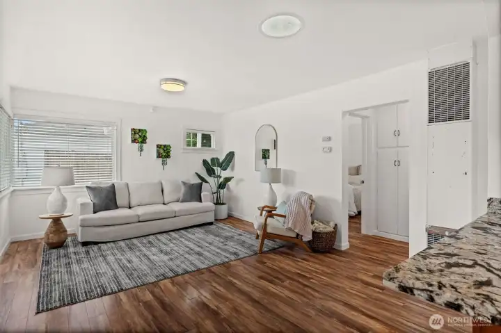 Bright, airy, and beautifully efficient. The main living space maximizes every square foot with optimal window placement, creating a warm and inviting hub. Bright, airy, and beautifully efficient. The main living space maximizes every square foot with optimal window placement, creating a warm and inviting hub.