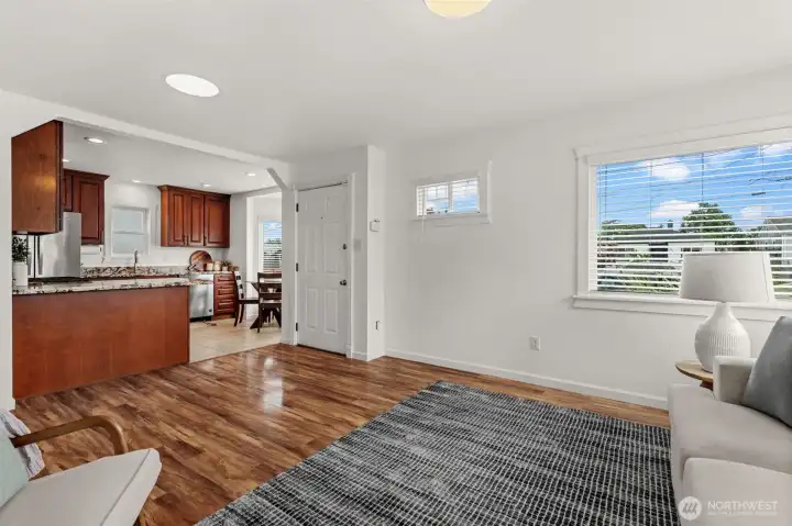 Bright, airy, and beautifully efficient. The main living space maximizes every square foot with optimal window placement, creating a warm and inviting hub. Bright, airy, and beautifully efficient. The main living space maximizes every square foot with optimal window placement, creating a warm and inviting hub.
