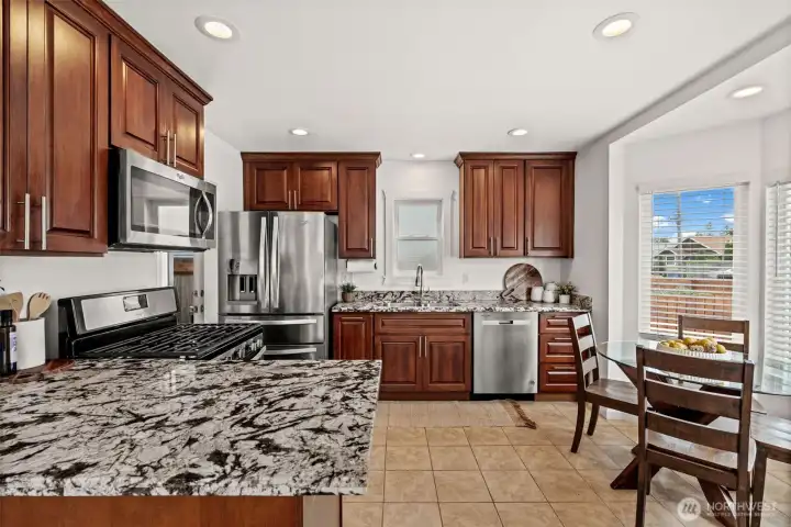Enjoy this kitchen's efficient design with a layout that keeps the home feeling open and bright. Enjoy this kitchen's efficient design with a layout that keeps the home feeling open and bright.