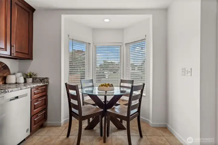 Bright, cheerful, and perfectly scaled. This sun-drenched window nook provides the perfect dedicated space for a dining setup without sacrificing an inch of kitchen functionality. Bright, cheerful, and perfectly scaled. This sun-drenched window nook provides the perfect dedicated space for a dining setup without sacrificing an inch of kitchen functionality.