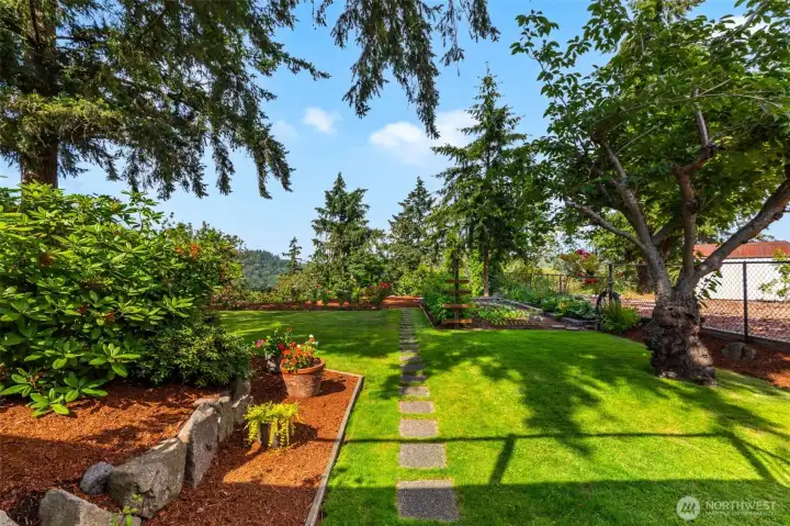Beautiful backyard path from lower patio to garden...