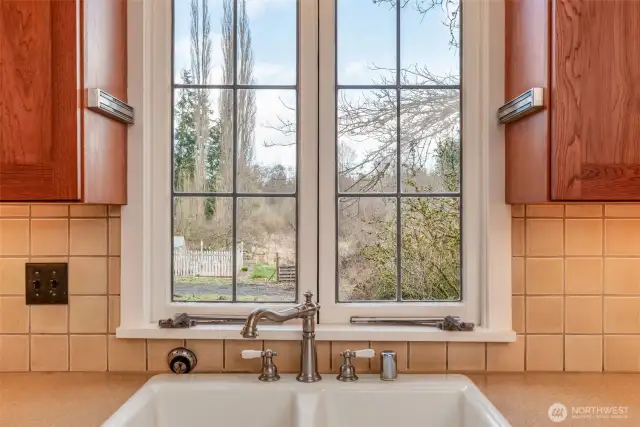 Leaded glass casement windows throughout house.