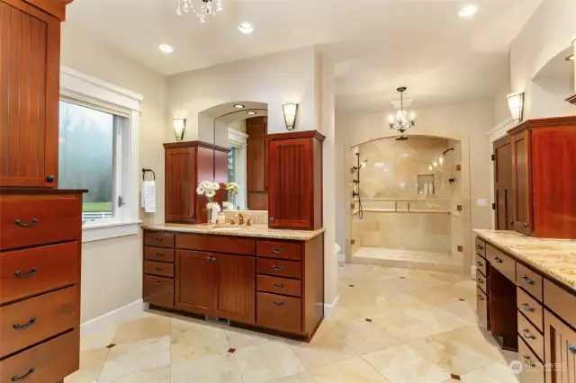 Separate vanities in the primary bathroom.