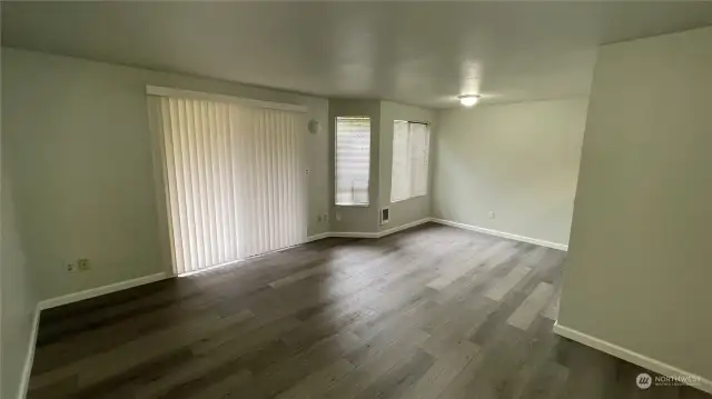 From front door, looking into Open-Concept Livingroom and Diningroom