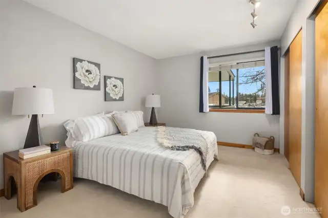 Primary Bedroom with Custom Birch Closet Doors