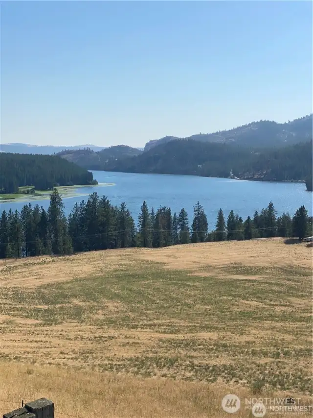 View from the road to the south west overlooking Long Lake just up the hill from hiway 291.