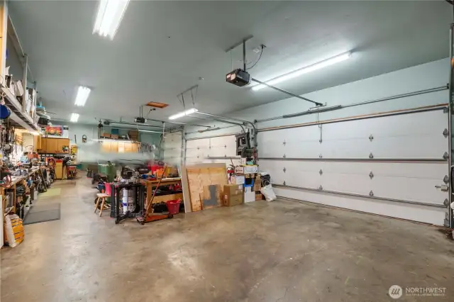 1250 Square foot garage, heated, pit for oil changes, etc. lots of electrical outlets, work benches thru out the structure.
