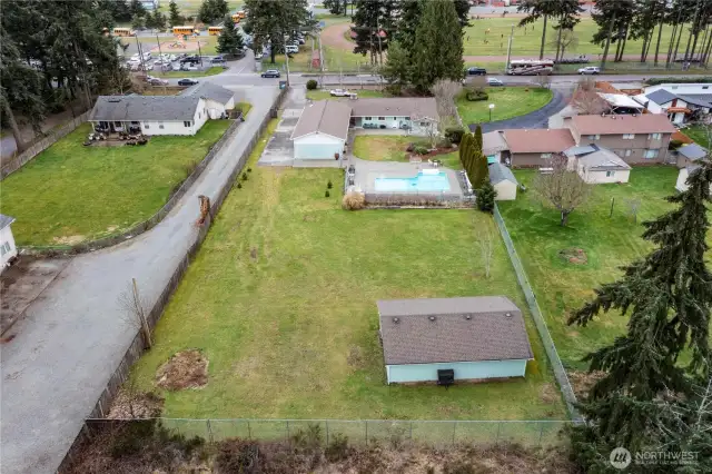 New roof installed on all the structures in 2017. Yard is fully fenced. Blackberry bushes running along fence next to pool.
