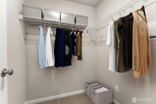 Primary Walk in Closet. Photos not of actual home. This is the same plan virtually staged. Plan, Colors, and options package may vary on actual home.