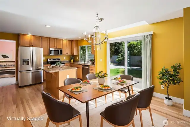 Kitchen with virtually staged breakfast nook.