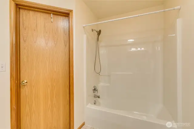 Low step into the tub.