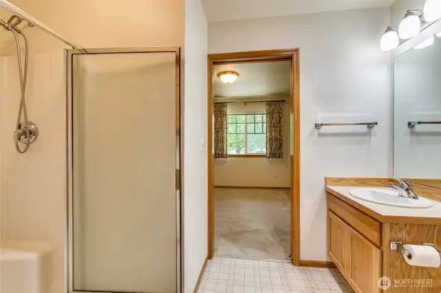 Second bathroom with a walk in shower.