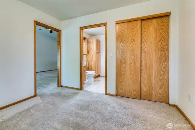 Second bedroom with pocket doors for increased accessibility.