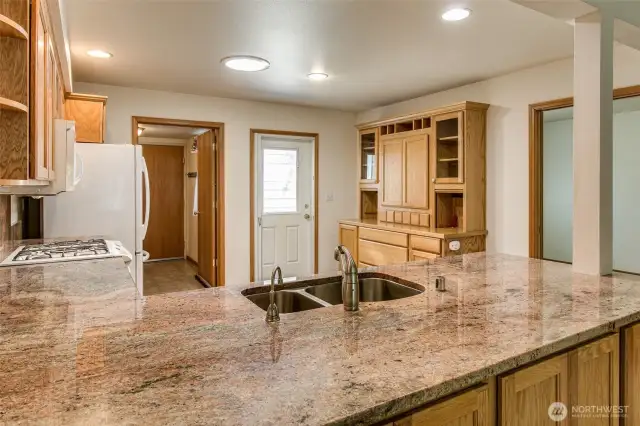 Skylight in the middle floods the kitchen with soft natural light throughout the day.