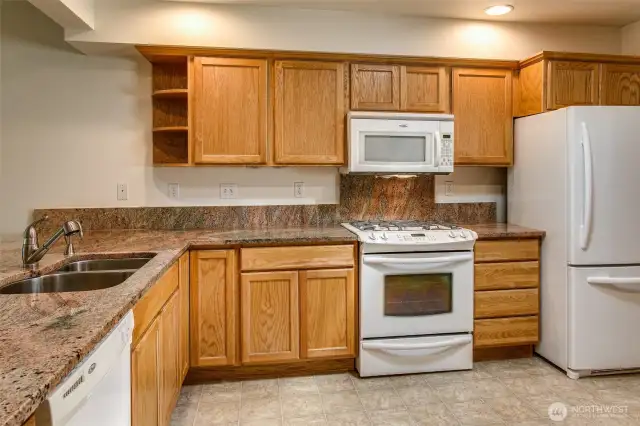 Kitchen features a gas stove for all your cooking needs.
