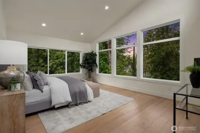 Designer primary suite with five-piece bath & heated floors