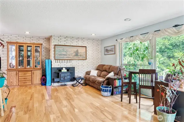 Wood burning fireplace and gorgeous floors!