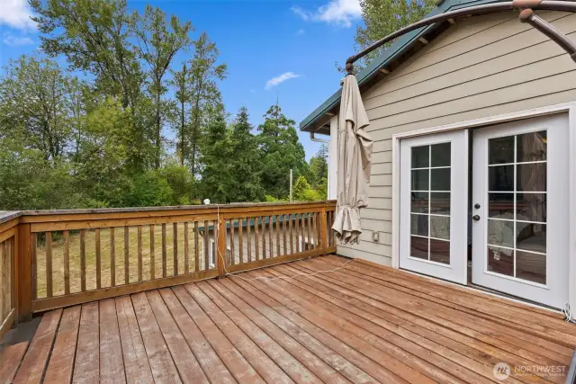 French doors to the porch off the primary bedroom.