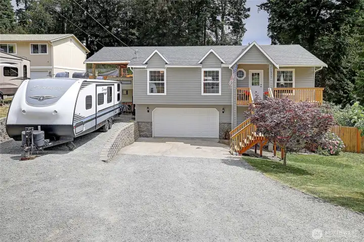 RV parking, fruit trees, designated garden beds