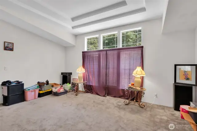 Formal living room with coffered ceiling.
