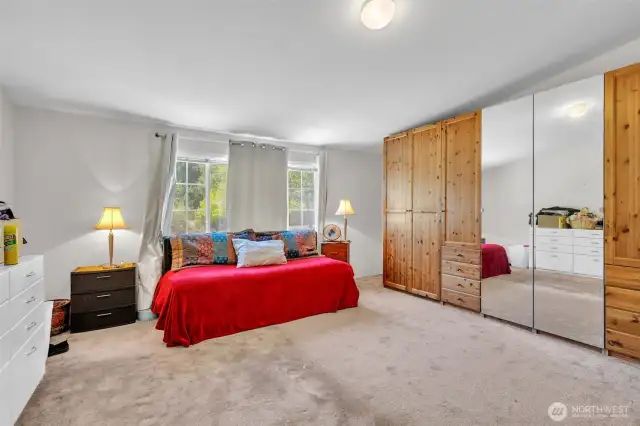 Primary bedroom with beautiful built in wardrobe.