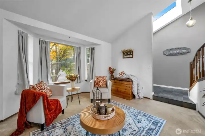 High ceilings, bay window & skylight for natural lighting.