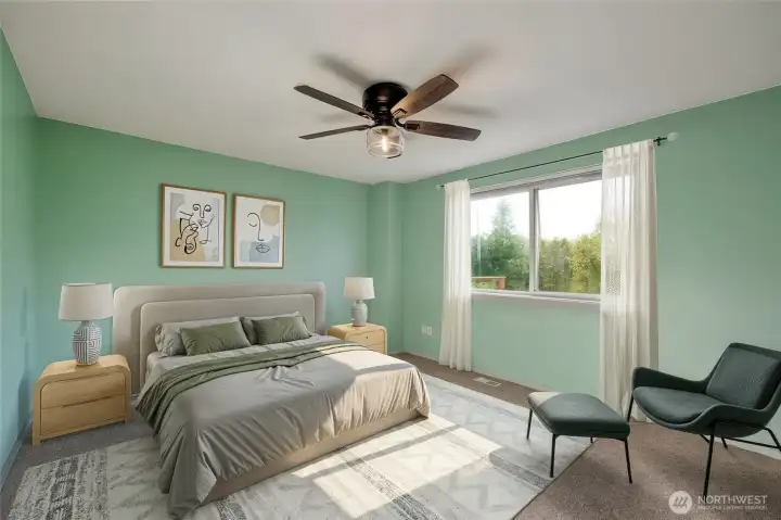 The main floor primary suite is spacious and serene, complete with a full ensuite bath. This private retreat offers comfort and convenience, with easy access to the rest of the main living areas.